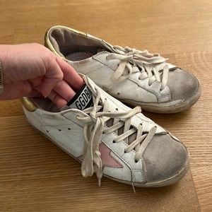 Golden goose pink and gold sneakers